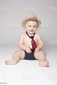 Baby Boy Wearing Hat And Tie Stock Photo Download Image Now Istock