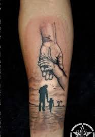 Holding Hands Tattoo Relive The Moment When You First Held The Hand Of Your Child By Getting This Tattoos For Daughters Father Daughter Tattoos Father Tattoos