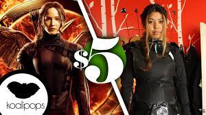 Katniss receives her infamous gold mockingjay pin immediately after the reaping and wears it as a choose the color that best suits your costume needs and attach a knife handle to the outside to replicate the. The Hunger Games Katniss Everdeen S Mockingjay Suit 5 Costume How To Youtube