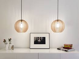 Hangelampen Aion Iumi Design Leuchte Aus Holz Ein Designerstuck Von Iumi Bei Dawanda Holz Hangelampe Holzpendelleuchte Lampen