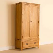 Terlihat di gambar adanya empat tingkatan rak baju untuk baju yang sudah dilipat. Jual Lemari Pakian Minimalis Kayu Jati Harga Murah Jepara Heritage