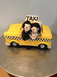 cake topper in yellow cab bride and groom cake toppers cake toppers nyc wedding cake topper in yellow cab bride and