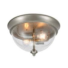 Flush mount fixtures installed in the middle of a ceiling are a common way to illuminate a room. Brand Hampton Bay