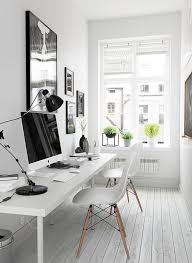 A simple white desk doesn't overwhelm a small space, and a floating shelf provides extra storage when floor space is scarce. There S So Much You Can Do With Your Tiny Office Space Let Us Show You Che Home Decorations 2017 Home Office Design Cozy Home Office Office Interior Design