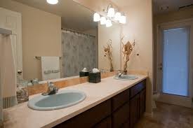 The bathroom is equipped with two modern mirrors suitable for use with family or couples. Unique And Inspired Bathroom Mirror Ideas