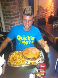 Fat guy eating a burger. Fat Guy S Burger Bar