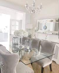 White dining room decorating ideas, glass top table in oval shape and white chairs. Pin By Traore On Dinning Area Dining Room Table Decor Dinning Room Table Decor Dining Room Table Centerpieces