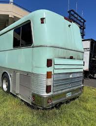 Image result for Silver 1990 Greyhound Bus