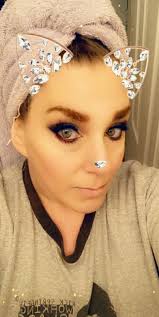 Went to Picnic in the Park today and ran across this awesome hair glitter,  Savannah just couldn't wait to get home and try it!