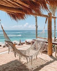 Palmilla Bali On Instagram In A Hammock By The Sea Is Where We Want To Be Itsjakemalpass Palmillabali Palm In 2020 Beach Hammock Bali Coastal Decor