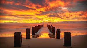 Description lowestoft seafront provides a traditional seaside experience with blue flag award winning sandy beaches, victorian seafront gardens, royal plain fountains, two piers and more. Winter Sunrise On Lowestoft Beach Photograph By David Powley