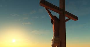 Jesus carrying the cross into the darkness.focus on back, square frame.crucifixion of jesus. The Timeline Of Jesus On The Cross In His Final Day