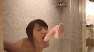 Watch a hot latina enjoy her dildo in a glass shower