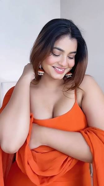 Kanak Mishra orange suit big boobs