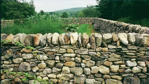 Dry stone walls are built without mortar, using techniques that are almost as old as humankind. How To Build A Dry Stone Wall Hunker Dry Stone Wall Stone Walls Garden Stone Retaining Wall