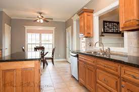 Oak kitchen cabinets are often a mainstay for some people who like natural concepts. The Kid Had The Back Bedroom Which Was The Largest David And I Made His Bed The Dresse Grey Kitchen Walls Oak Kitchen Cabinets Wall Color Kitchen Wall Colors