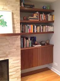 Maybe you would like to learn more about one of these? Modern Built In Desk And Cabinets Built In Walnut Wood Shelves And Cabinet Modern Living Built In Shelves Living Room Living Room Shelves Modern Shelving