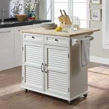 For building your own kitchen island cart, you could easily pick up a cabinet at a habitat for humanity store or buy one at your local home improvement center. Usl Portland Polar White Kitchen Cart With Natural Wood Top Sk19276c2 The Home Depot White Kitchen Cart Kitchen Cart Elegant Kitchen Design