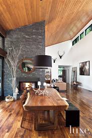 This stylish wooden dining table with rustic charm will make a distinctive addition to your kitchen or dining room. Contemporary Wood And Stone Dining Area Rustic Dining Room Modern Farmhouse Living Room Decor Farmhouse Dining Rooms Decor