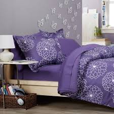 A Purple Comforter Set Covered With Big Beautiful Blooms Purple Dorm Rooms Purple Bedding Purple Comforter
