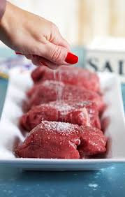 Raw Filet Mignon On A White Plater With Kosher Salt Being Sprinkled Over Them Filet Mignon Recipes Best Filet Mignon Recipe Recipes