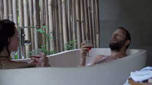 Looking for a good deal on bathtub wine? Happy Couple Drinking Wine And Stock Footage Video 100 Royalty Free 22822531 Shutterstock