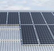 Pitched roof with trapezoidal metal sheets covering ...