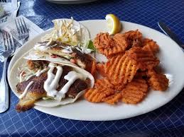 Enjoy live music nearly every day, and sip the only true toes in the sand, drinks in hand experience on hilton head—the legendary tiki hut is the island's best beach fish tacos 12 two blackened fish tacos, cabbage, pico, cilantro, lime sauce. Fish Tacos Picture Of Skull Creek Boathouse Hilton Head Tripadvisor
