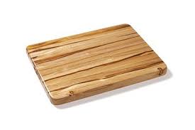 The Best Cutting Boards Reviews By Wirecutter Paddle design with handle and leather hanging accent.
