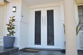 For the mediterranean look, try the arched double doors with iron grills. Brisbane Doors Front Entry Internal External Styles