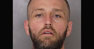 Man charged with killing step-mother, neighbor