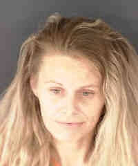 Cops: Woman uses cocaine in car with child