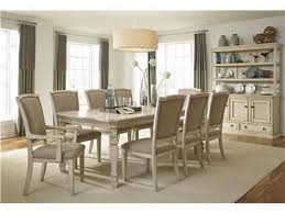 Shop For Ashley Signature Design Dining Room Extension Table D693 35 Made With Select Oak Veneers A Casual Dining Rooms Dining Room Sets Dining Room Server