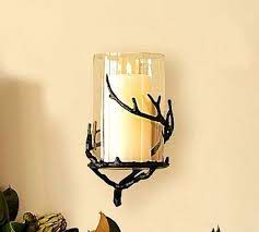 The shade is attached to powder coated steel hardware. Pottery Barn Twig Hurricane Candle Holder S Wall Mount Potterybarn Candle Wall Sconces Wall Mounted Candle Holders Wrought Iron Candle Wall Sconces