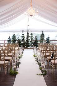 10 Gorgeous Evergreen Wedding Arrangements Mywedding Evergreen Wedding Wedding Ceremony Decorations Outdoor Outdoor Wedding Ceremony