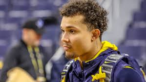 Roman Wilson, a Hawaii native, reacts to wildfire devastation in home state