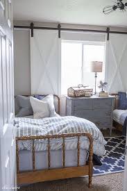 Navy And Ticking Boys Room Ella Claire Co Farmhouse Style Bedroom Decor Farmhouse Style Bedrooms Modern Farmhouse Style Bedroom