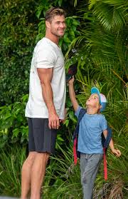 Chris hemsworth took to his instagram account to share a sweet shot of his twin sons, tristan and sasha while enjoying a day in byron bay, australia on chris hemsworth's wife shared an adorable birthday photo of their twins, tristan and sasha. A Barefoot Chris Hemsworth Picks Up His Six Year Old Twin Sons Tristan And Sasha From School Daily Mail Online