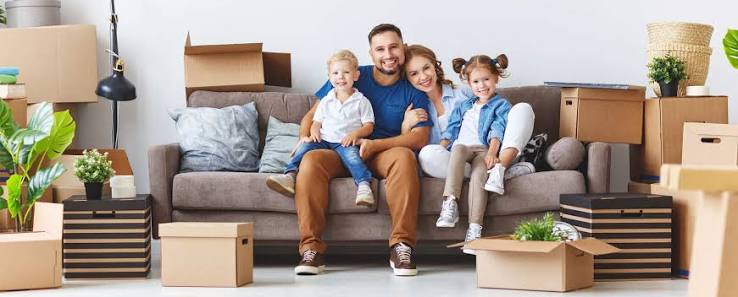 Family relaxing in their new home after a professionally organised move