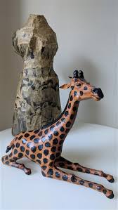 To make the animal head i started with newspaper and masking tape: Paper Mache Giraffe Large Decorative Display