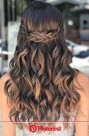 Section off the top part of your let the rest of the hair hang down loose for a more voluminous look. 43 Gorgeous Half Up Half Down Hairstyles That Perfect For A Rustic Wedding Easy Hairstyles For Long Hair Curly Hair Styles Naturally Long Curly Ha Clara Beauty My