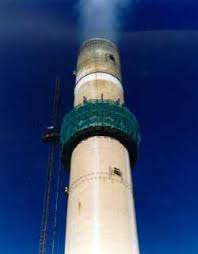 A football game taking place in rugeley, staffordshire, was interrupted by the controlled demolition of 4 chimneys at a power station in the town. Reinforcing The Rugeley Chimney