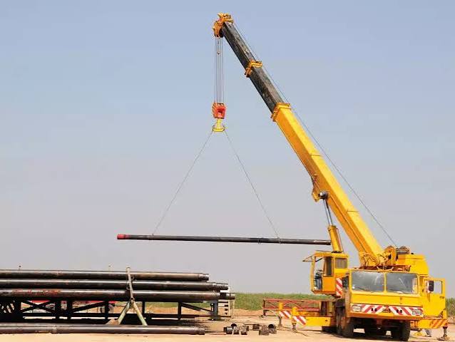 Construction crane and excavators