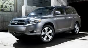 The new highlander is slightly longer than its predecessor, and that extra room increases the cargo space on the doors we have some harder plastics, and also this kind of weird dark gray wood grain pattern. 2008 Toyota Highlander Hybrid Image Photo 26 Of 31