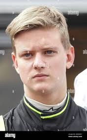 German racing driver Mick Schumacher of the Dutch team 'Van Amersfoort  Racing' walks through the pit lane at the Motorsport Arena in  Oschersleben,Germany, Wednesday, April 8, 2015. The teenage son of former