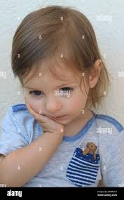 Teddy in my pocket hi-res stock photography and images