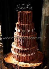 Www Scrumptiouscakes Co Uk 1095 4 Tier Chocolate Flake Wedding Cake With Mr Mr Chocolate Wedding Cake Wedding Cake Alternatives Wedding Cake Presentation