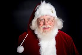 Cincinnati Santas pose for pictures in the Enquirer newsroom