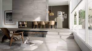 In this contemporary bathroom by katch i.d., large marble tiles are put together to maintain the natural veining of the stone. Abk Re Work
