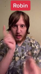 Guy in Robin Costume with Pizza